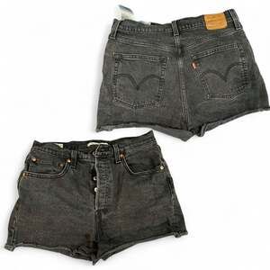 Size 30 Levi's Women's 501 Original High-Rise Cut-Off Denim Shorts in Washed Bla